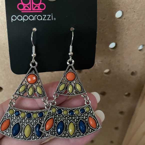 Pyramid shaped daylight silver earrings with orange, green, and navy stones.